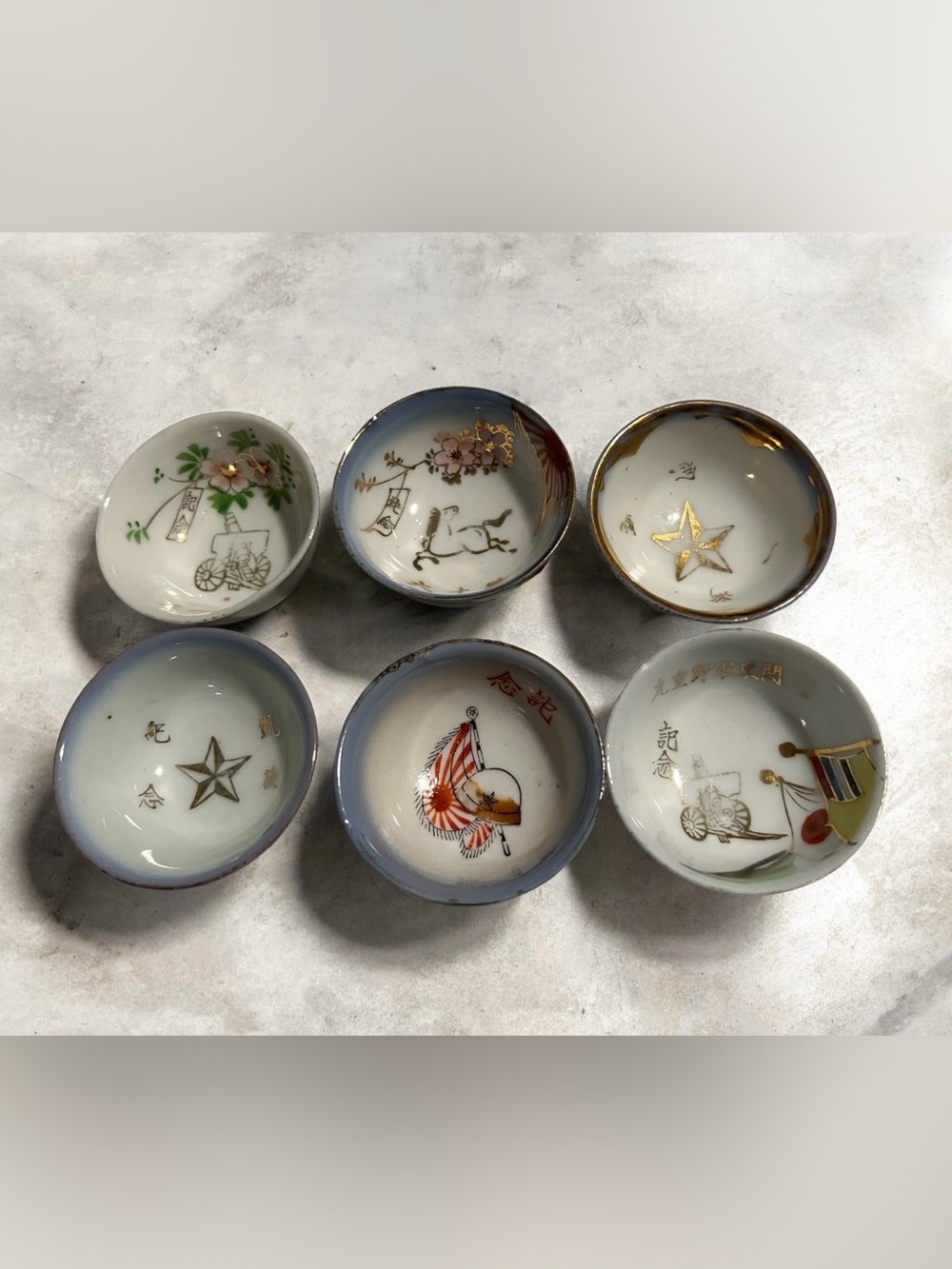 WWII The Imperial Japanese Army's 1st
Guards porcelain sake cups with patriotic